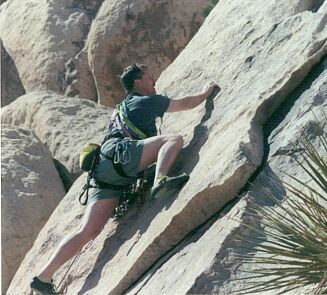 climbing a rock face